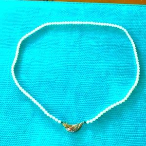 Beautiful Pearl necklace with 14K gold clap.